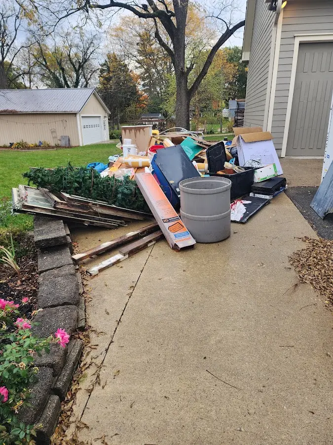 Dumpster being loaded with debris for 30 Yard Dumpster Rental in West Donegal